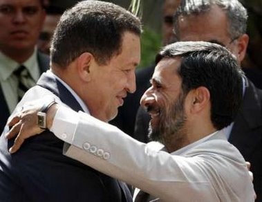 Uuugghhh!!! Get a room! Chavez and Ahmadinejad in a US-hate love embrace!